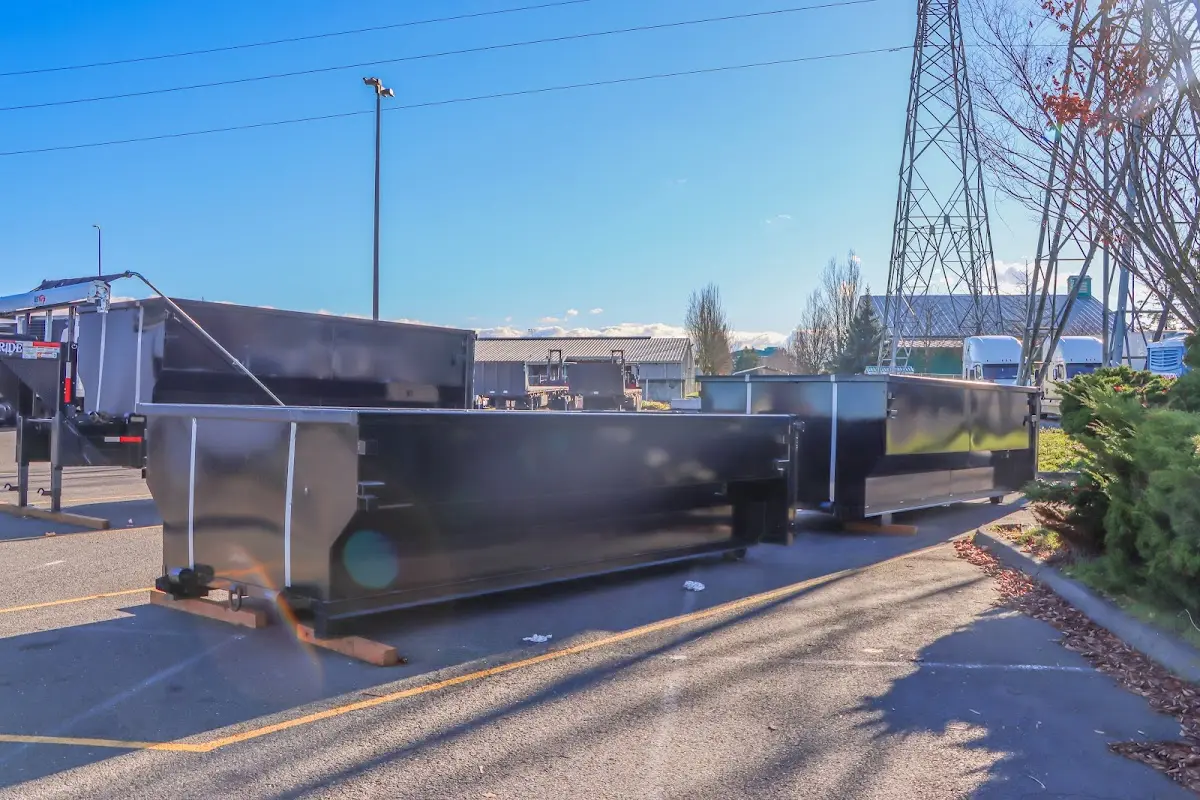 Roll-off dumpster ready for waste disposal at job site for 15 Yard Dumpster Rental in Freeport